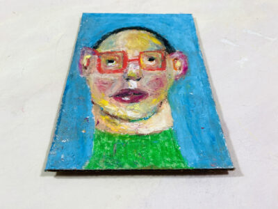 Oil pastel drawing of a man wearing red glasses