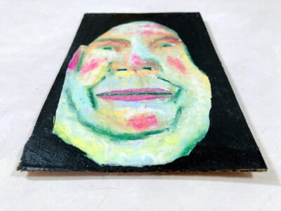 Oil pastel portrait drawing of a happy go lucky man