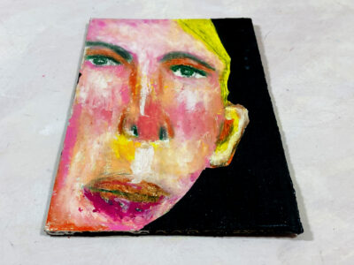 Oil pastel portrait drawing of a blonde man