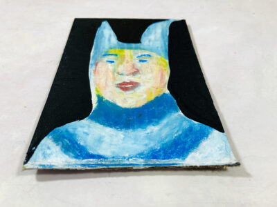 Oil pastel man portrait drawing of a man wearing blue bunny ears