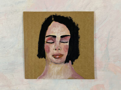 Acrylic portrait painting of a dreaming woman on cardboard