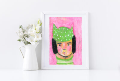 4x6 oil pastel portrait painting of a girl wearing a green polka hat titled Winter's Grace by Katie Jeanne Wood