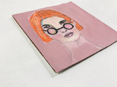 Oil pastel drawing of a smart woman by Katie Jeanne Wood