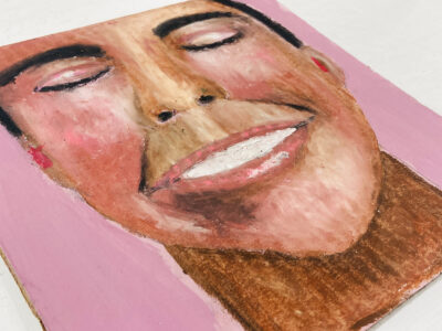 Oil pastel drawing of a happy, smiling person by Katie Jeanne Wood