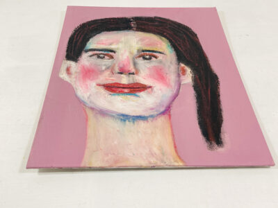 Oil pastel portrait painting of a woman with a side ponytail by Katie Jeanne Wood