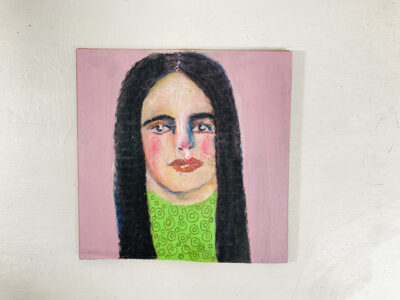 Disbelieving woman with long black hair by artist Katie Jeanne Wood