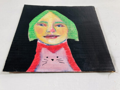 Portrait painting of a woman with a pink cat in her lap by Katie Jeanne Wood