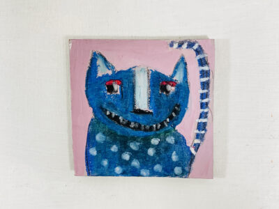 Silly grinning blue polka dot cat painting by artist Katie Jeanne Wood