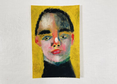 Oil pastel painting of a man on construction paper by Katie Jeanne Wood