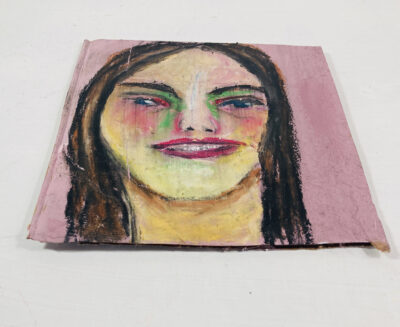 Oil pastel portrait painting of a woman with braces by Katie Jeanne Wood