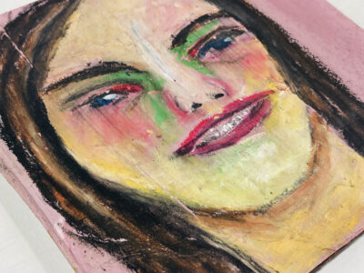 Oil pastel portrait painting of a woman with braces by Katie Jeanne Wood