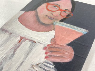 Acrylic portrait painting of a woman with a pink drink in hand by Katie Jeanne Wood