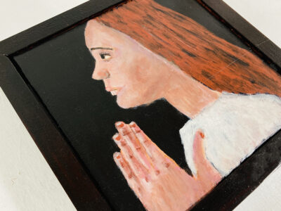 Acrylic portrait painting of a girl praying or meditating with a heavy handmade mahogany frame