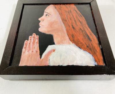 Acrylic portrait painting of a girl praying or meditating with a heavy handmade mahogany frame