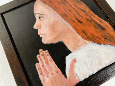 Acrylic portrait painting of a girl praying or meditating with a heavy handmade mahogany frame