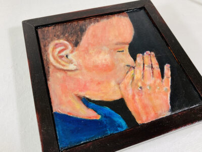 Acrylic portrait painting of a boy praying or meditating with a heavy handmade mahogany frame