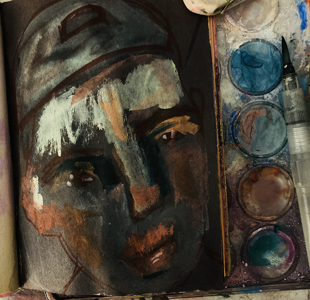 Boy wearing baseball cap portrait paintings in art journal by Katie Jeanne Wood Aka Miz Katie