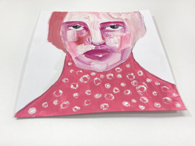 Pink tonal gouache portrait painting of a woman by Katie Jeanne Wood