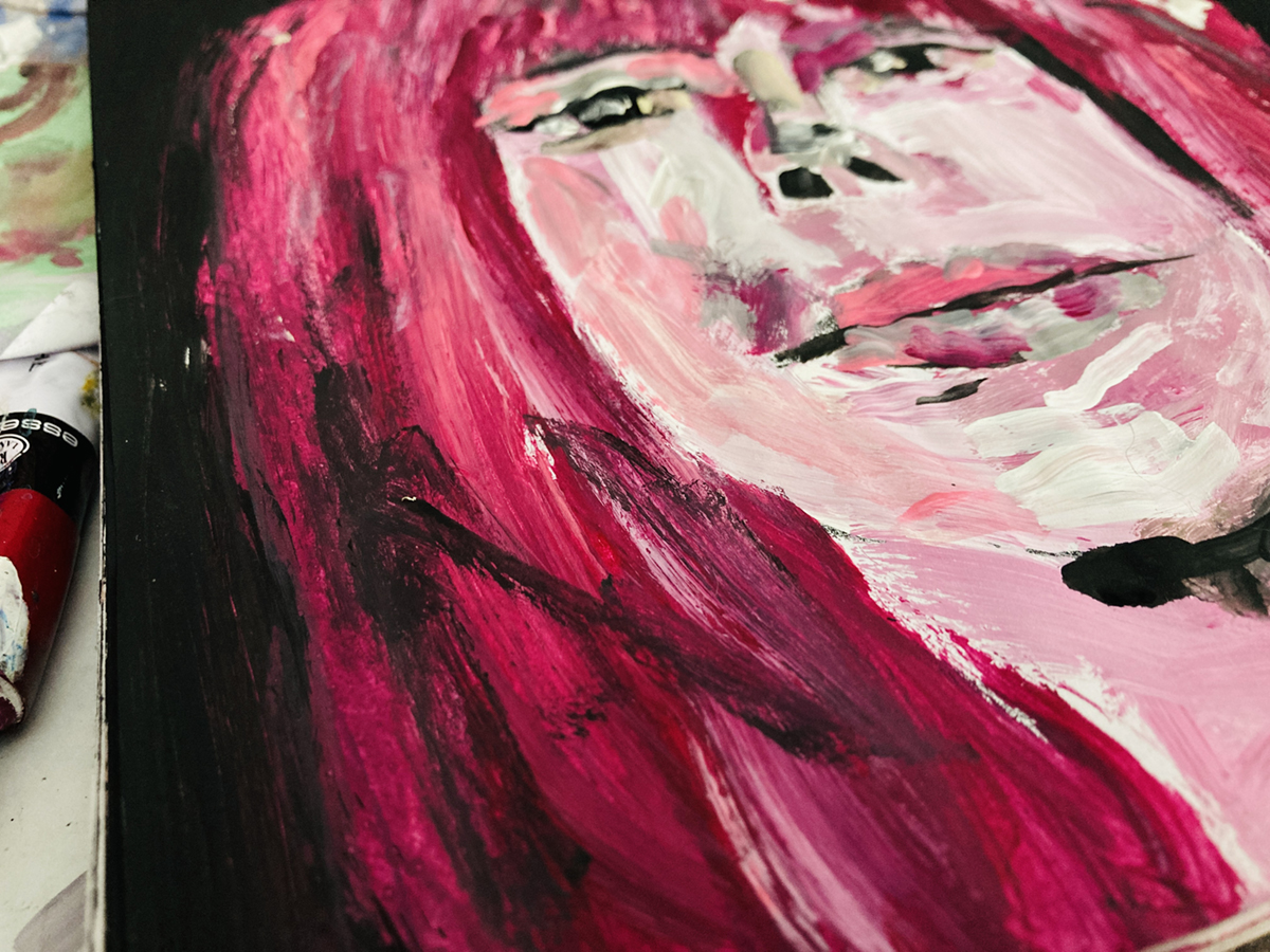 Mixed media art journal portrait painting of a woman with pink hair by Katie Jeanne Wood