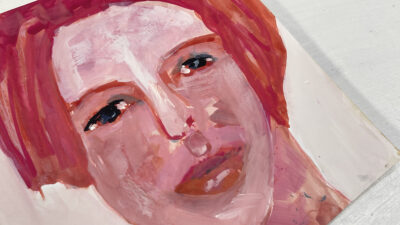Pink gouache portrait painting titled Creative Tension by Katie Jeanne Wood