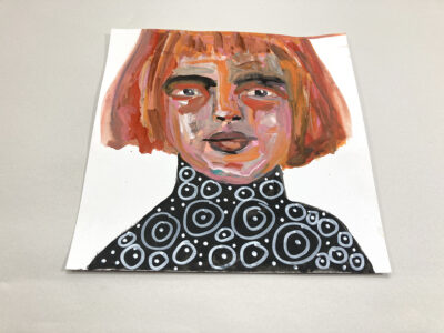 Gouache portrait painting of a woman with orange red hair titled From Time To Time by Katie Jeanne Wood