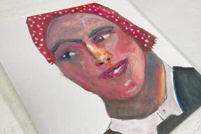 Gouache portrait painting of a woman with polka dotted red hair titled Happily Scrutinizing by Katie Jeanne Wood