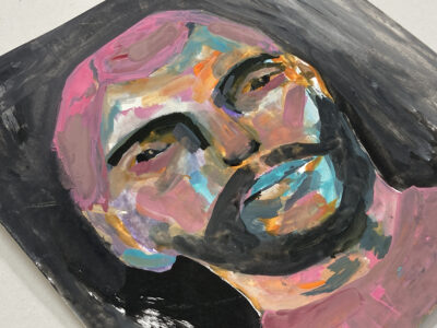 Gouache portrait painting of a man with a beard titled In The Shadows by Katie Jeanne Wood