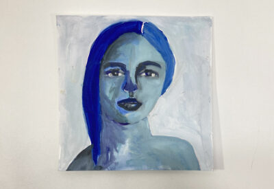Original expressive blue tonal gouache portrait painting of a woman titled Stripped Bare by Katie Jeanne Wood