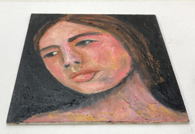 Revising an oil portrait painting of a woman outside on a starless night