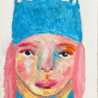 Oil pastel drawing of a girl wearing a blue kitty winter hat.